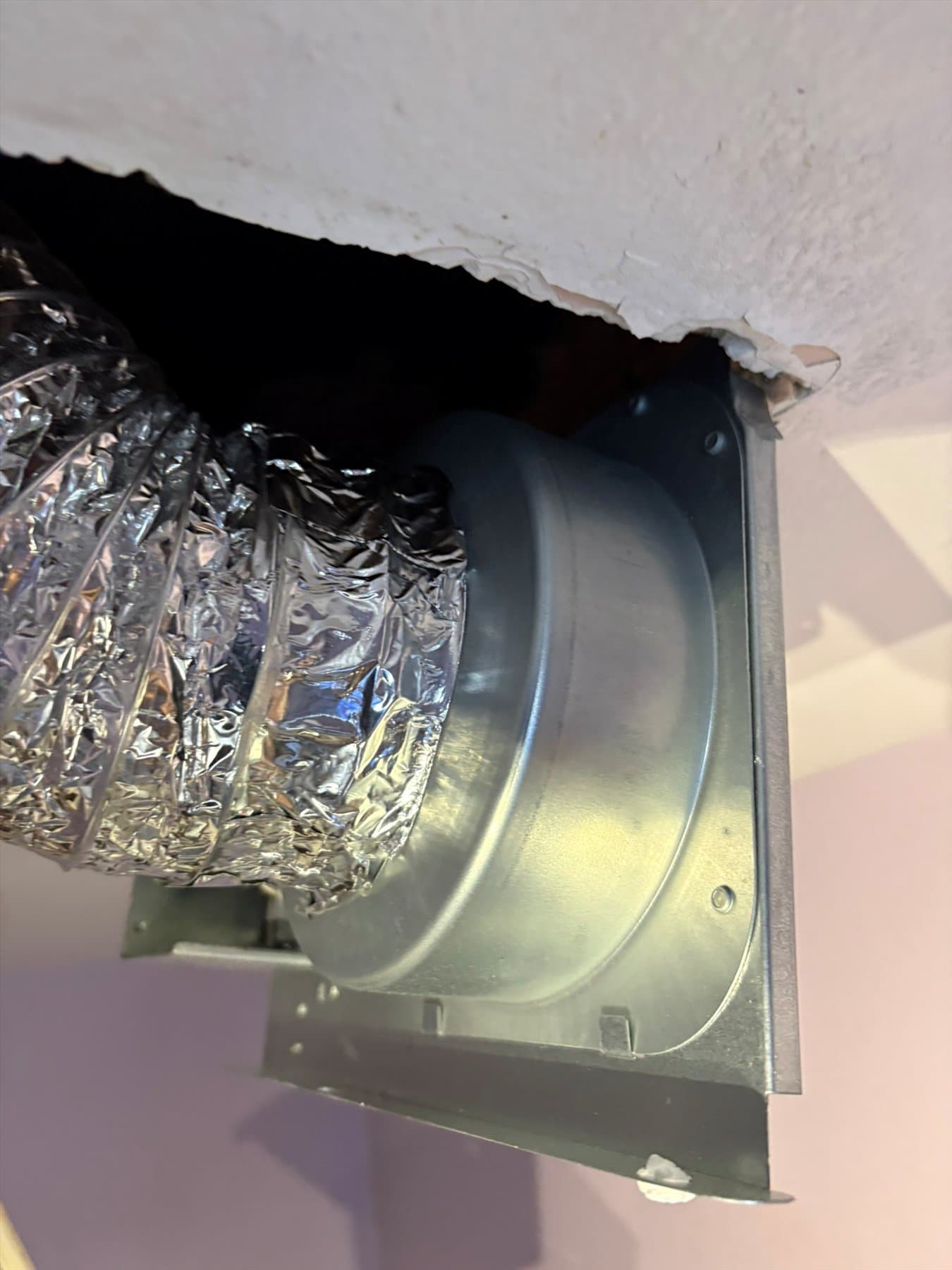 Bathroom fan duct and housing connection during the correction