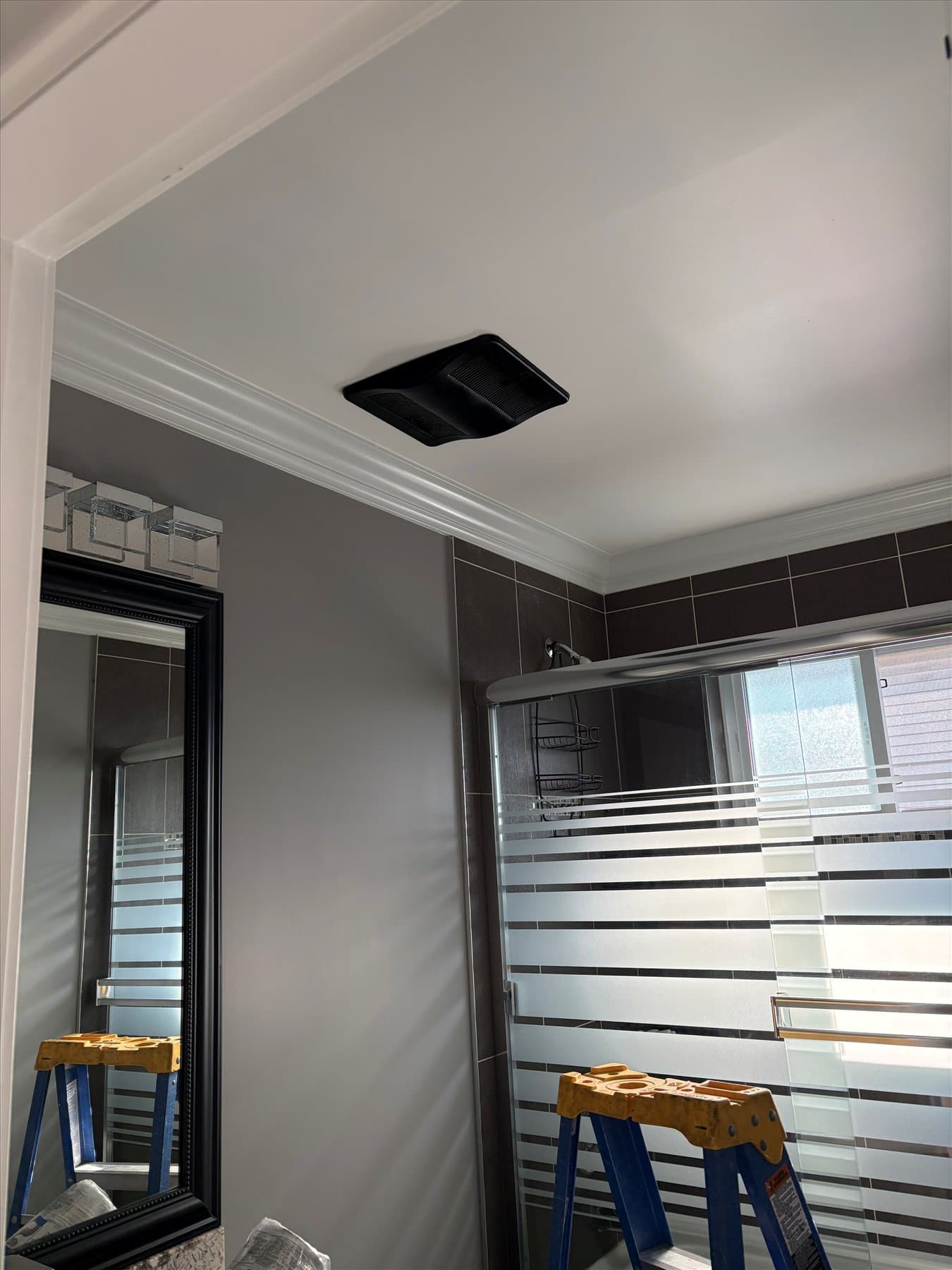 Existing ceiling opening for a Cloverdale bathroom fan