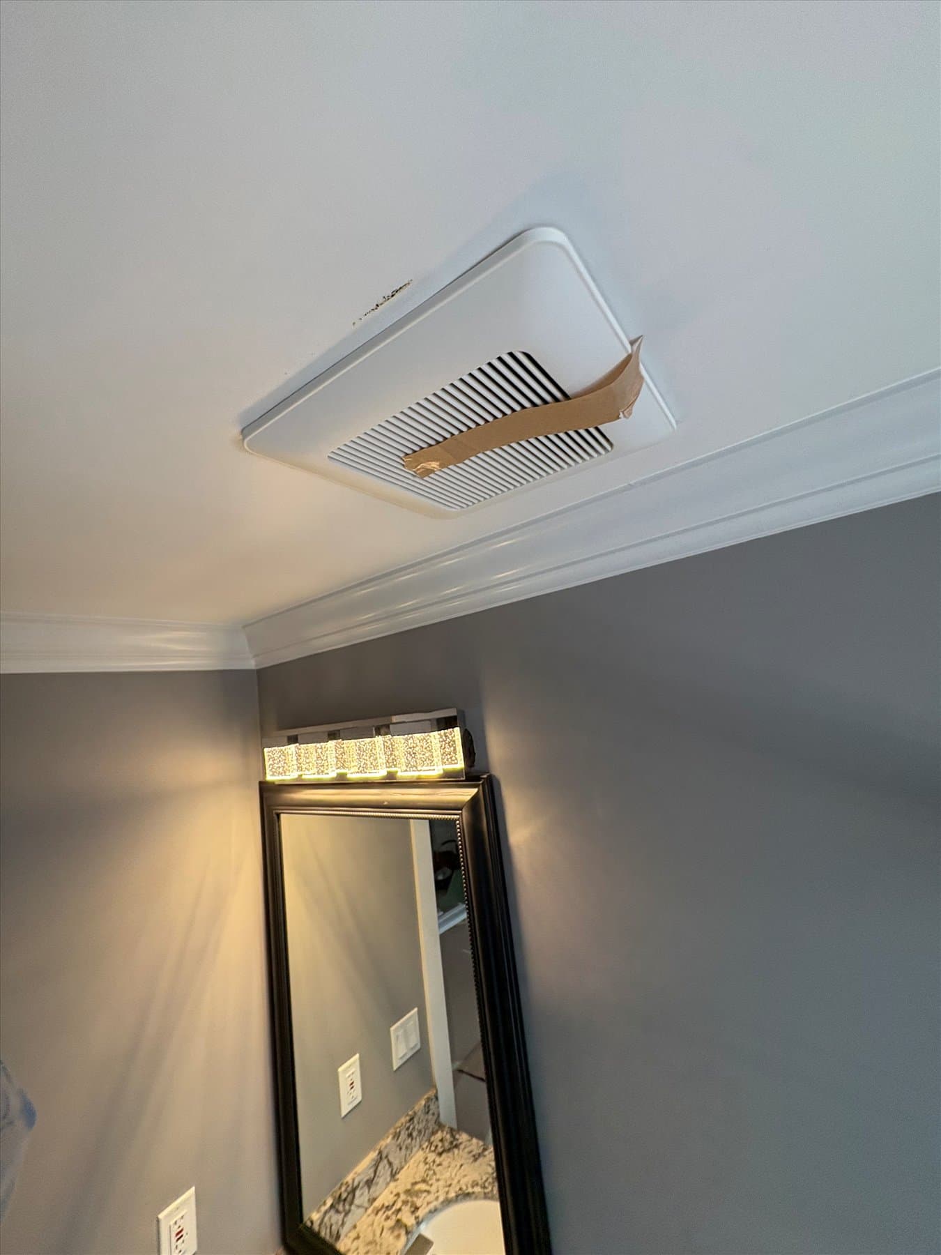 Finished bathroom fan grille in Cloverdale